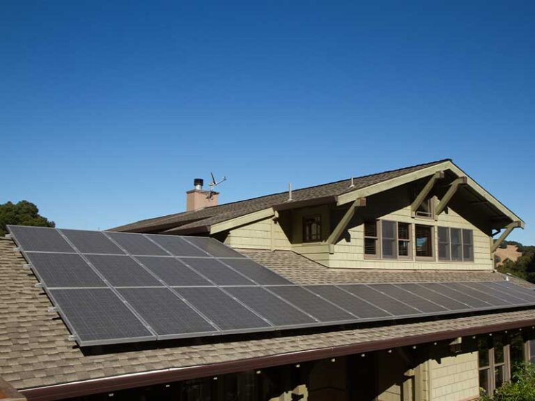 solalr panels on the roof of a two story home