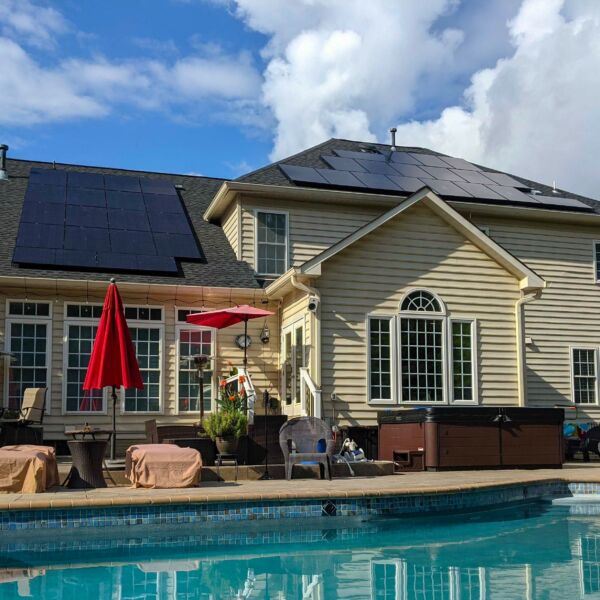 home with pool and solar panels