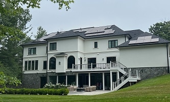 back view of a vienna va home with solar panels