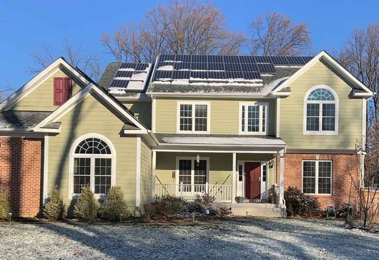 Snow melting off solar panels on Northern Virginia home