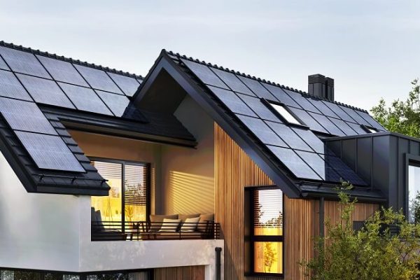 solar panels on the roof of a beautiful modern home
